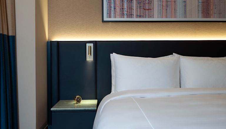 Bettdetail in einem Gästezimmer