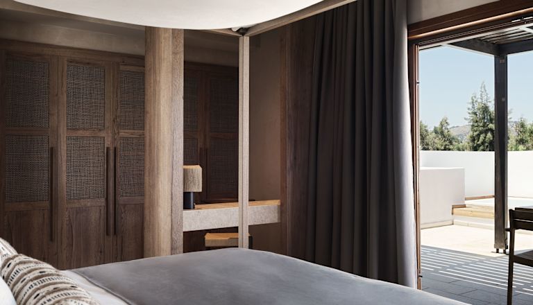 Large Bed in a King Junior Suite with Jetted Tub