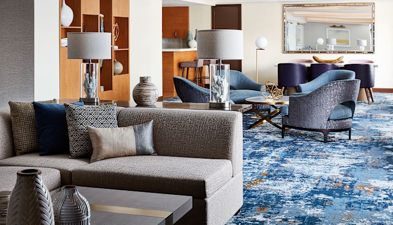 Guest Suite Living Room with Sofa, Coffee Table and Armchairs