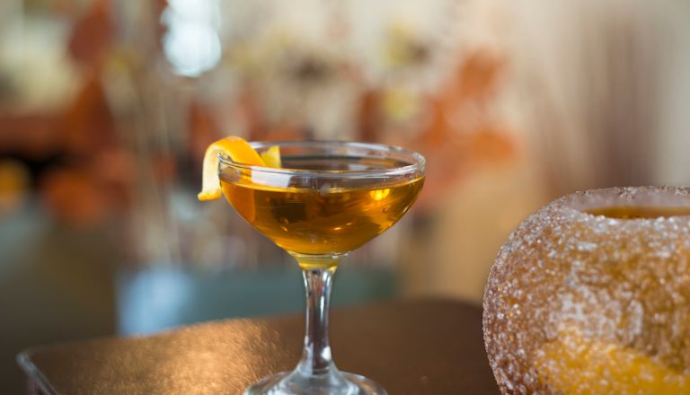 Kismeth Drink garnished with a orange