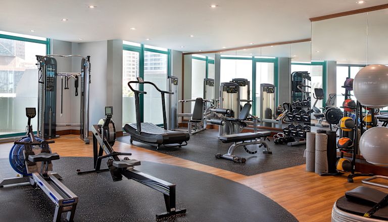 Modern Equipment in a Fitness Center with Large Windows