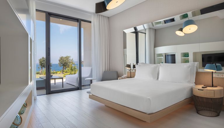 Premium suite met kingsize bed en slaapkamer