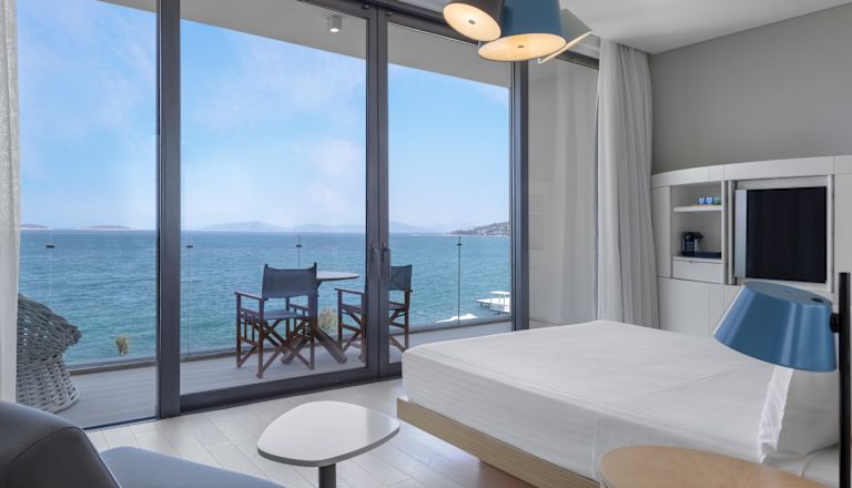 Premium slaapkamer met kingsize bed en balkon