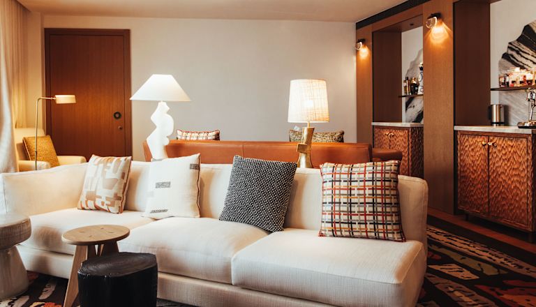 Sofa and coffee tables in modern and spacious suite