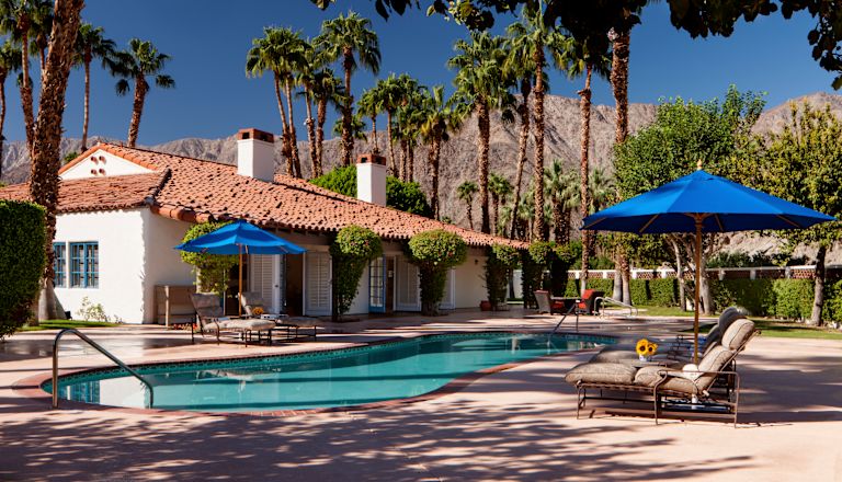 Hacienda Suite outdoor pool with mountain landscape in the distance