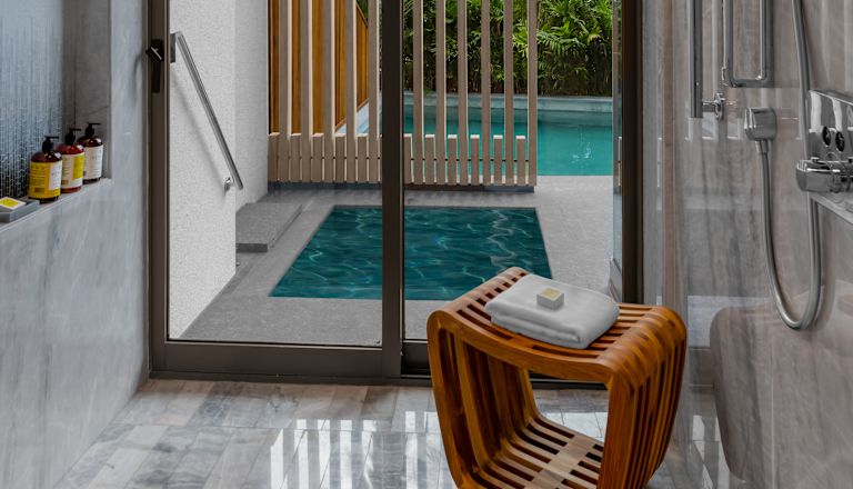 shower with view of private pool