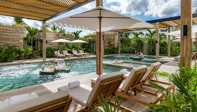 outdoor pool and lounge chairs