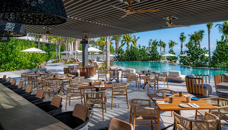 outdoor dining seating by pool