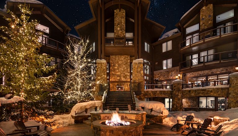 Hotel Exterior and Fire Place in Outdoor Patio