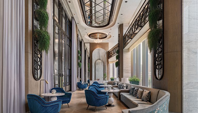 Meeting Area with Couches and Blue Seats