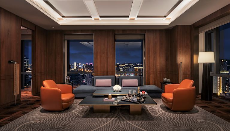 Two Bedroom Suite Living Area with sofa and chairs