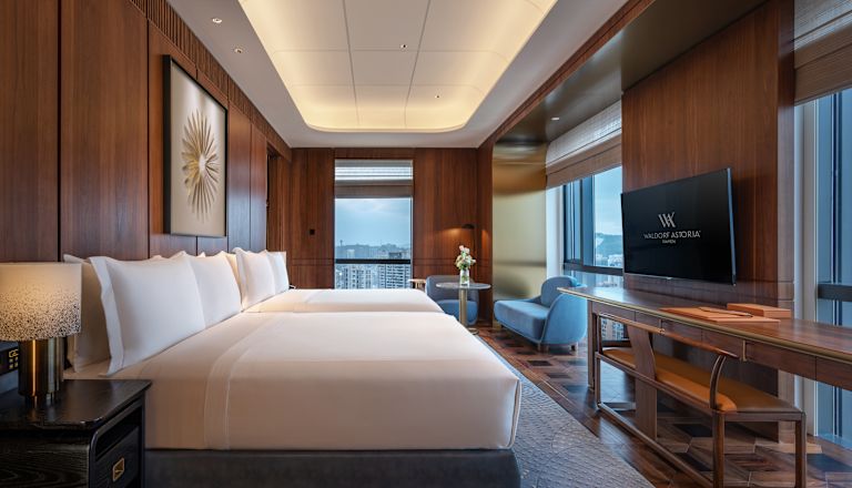 Guest Room with Two Queen size Beds HDTV and City View