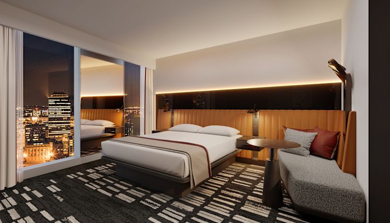 Pokoj s jedním lůžkem King, pohovkou lounge a francouzskými okny s výhledem na město