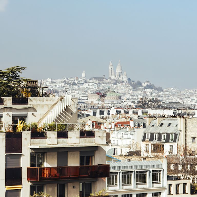 Paris City views from the rooftop of the hotel. Sacre Coeur.