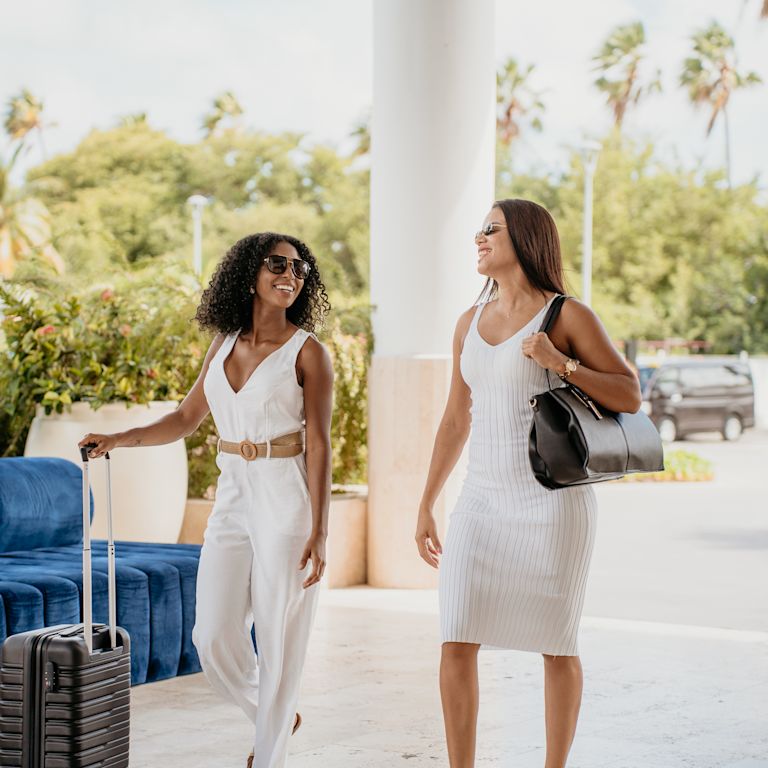 guests walking to the hotel entrance