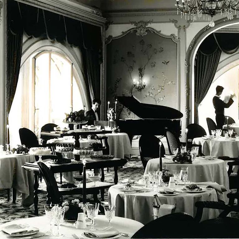 Old shot of Pompadour restaurant with waiter