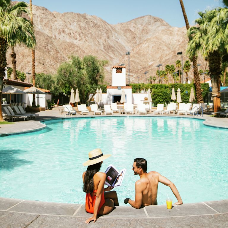 A couple relaxing in a pool