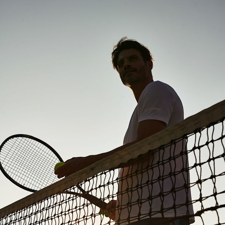 Man Playing Tennis