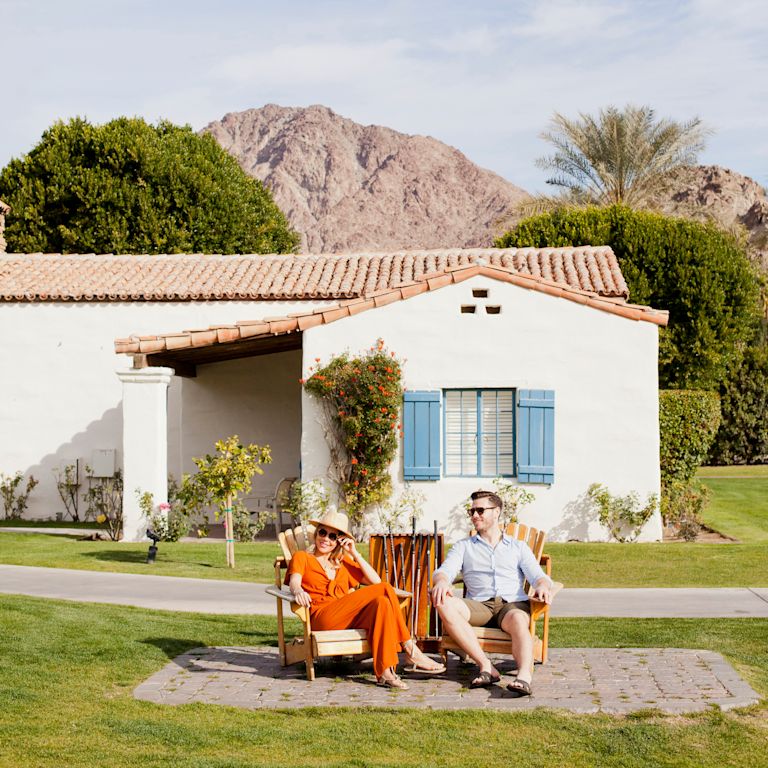 Man and woman relaxing outside