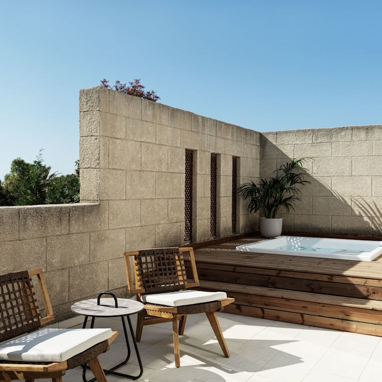 Private Outdoor Pool with Sitting Area in a Hotel Suite