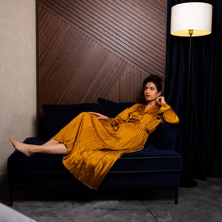 woman on chaise lounge