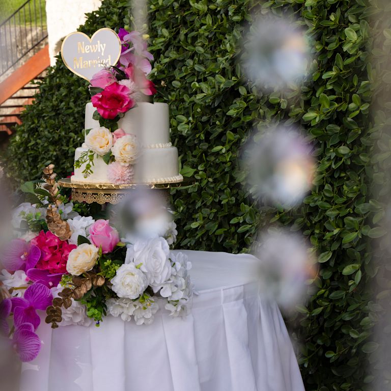 Wedding cake on hotel courtyard