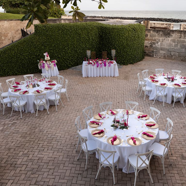 Wedding dinner in exterior hotel courtyard
