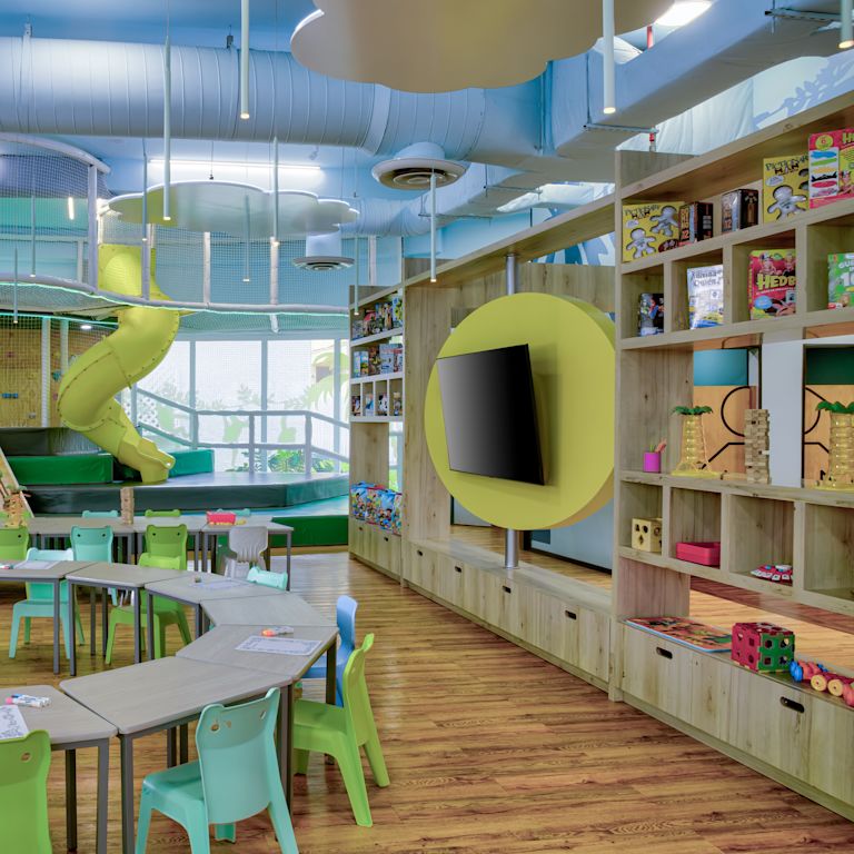 entertainment area with chairs and tables