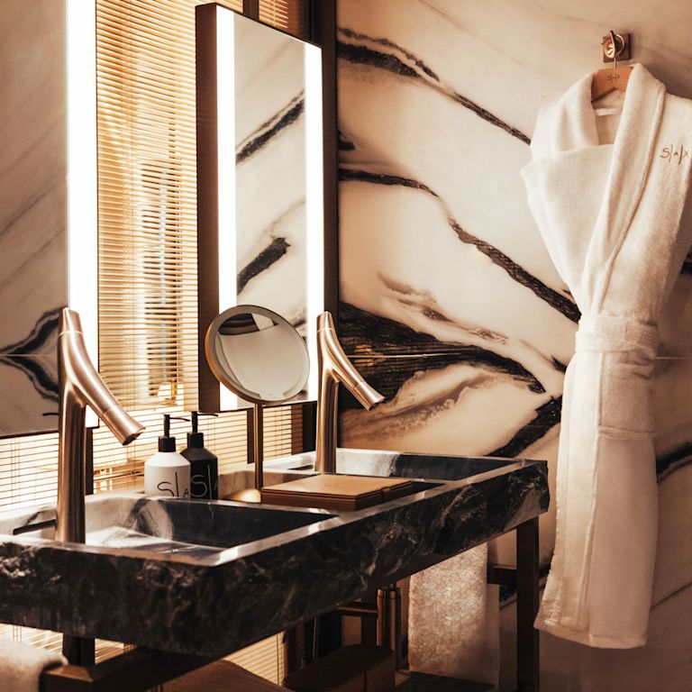 Double sinks in marble bathroom
