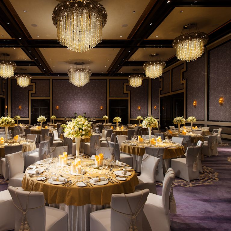 Spacious Grand Ballroom with Round Tables and Chairs