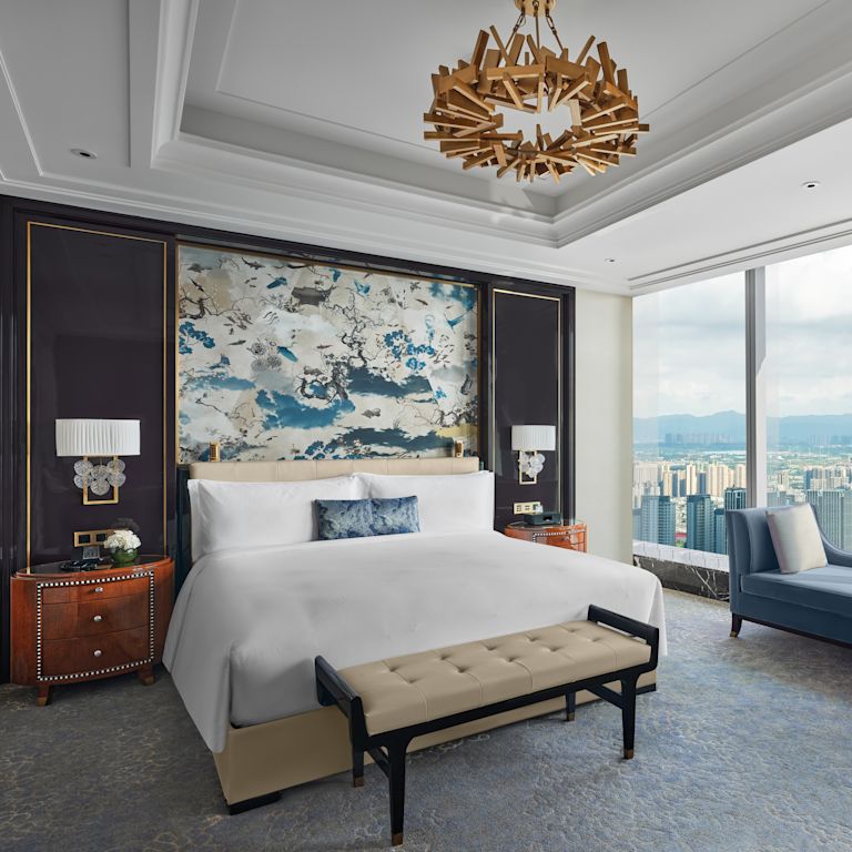 guest room, 1 king bed, sofa, window view of the city