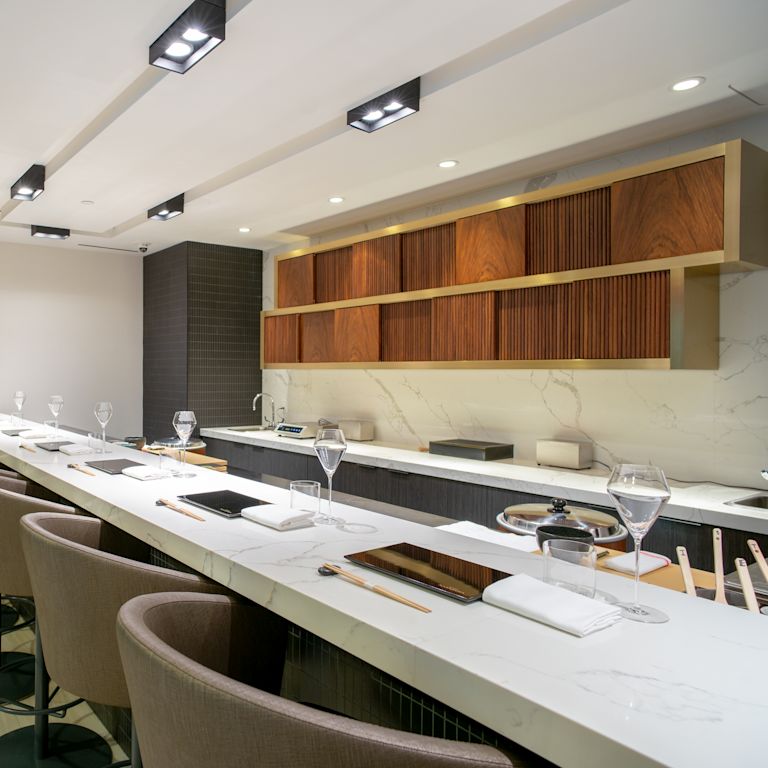 Bar with curved chair setup