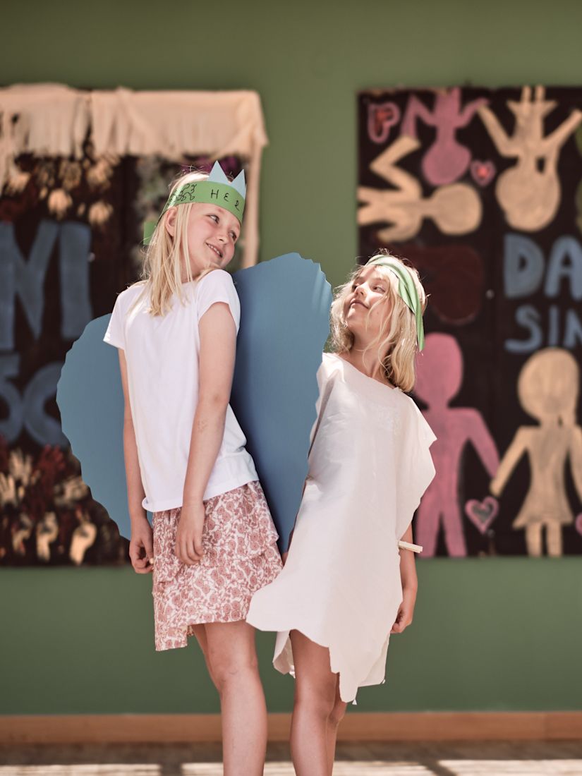 Two Girls in Angels Costumes Acting