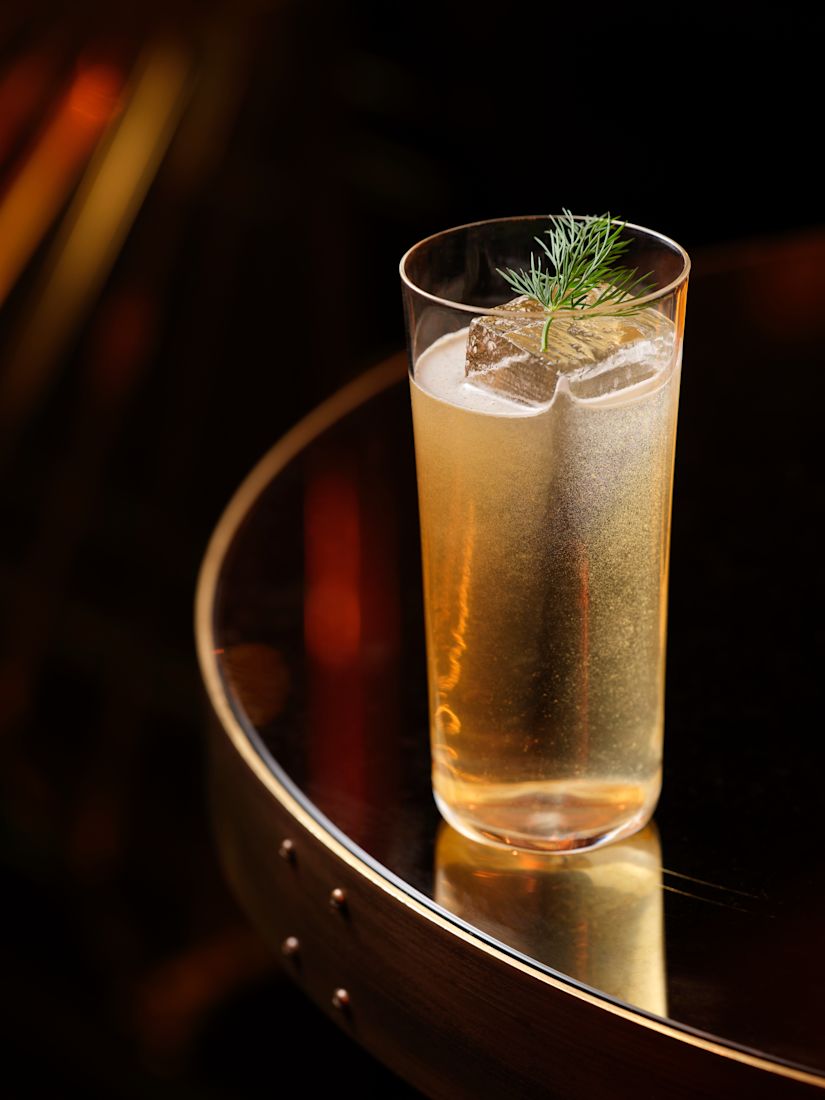 Cocktail on table with dark background in Twenty8 NoMad-previous-transition