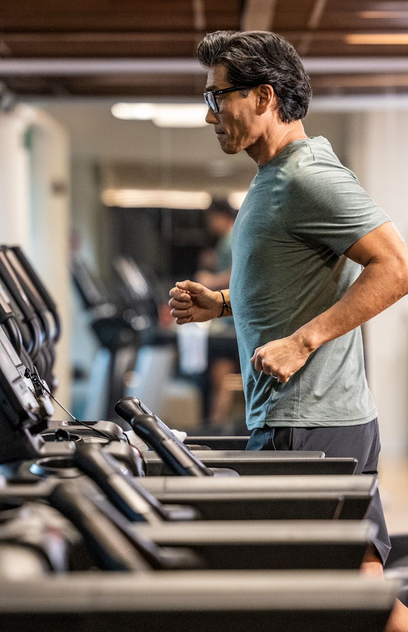 Man on treadmill in the fitness center.