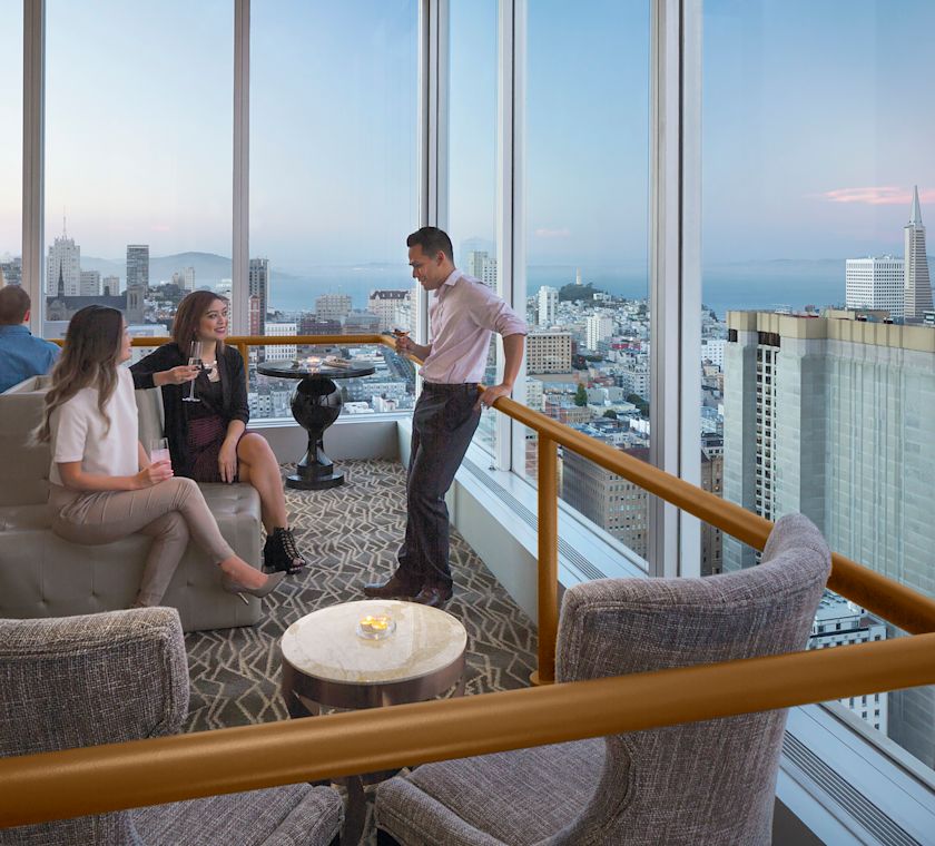 People Having Drinks at Cityscape Sky Bar with Views of the City