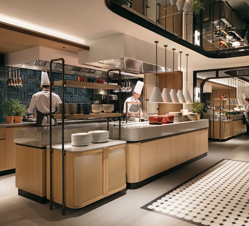 Residential style kitchens with staff