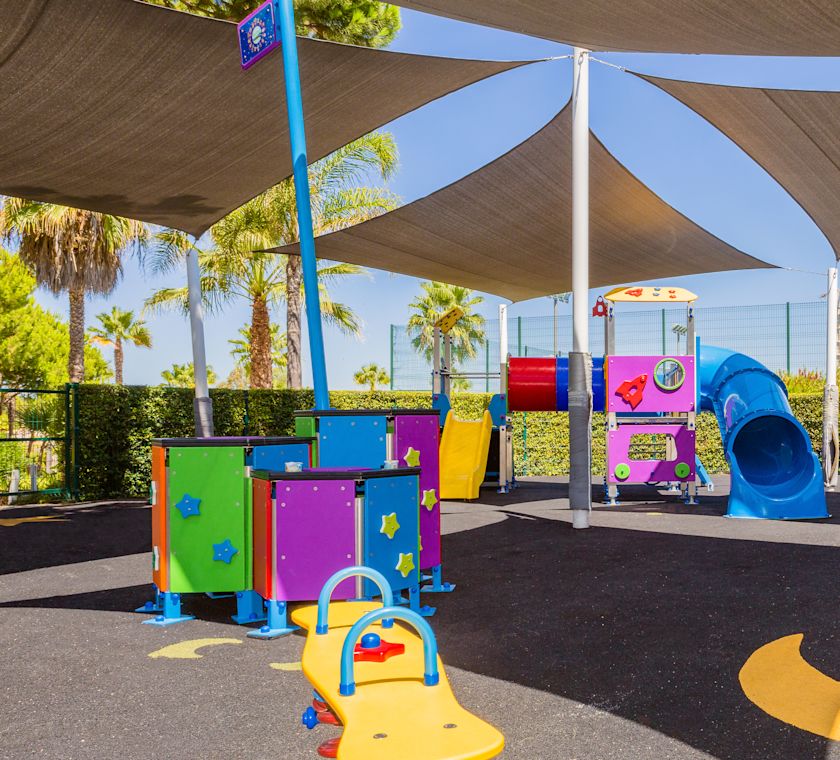 Children's playground, slides, tetter totter