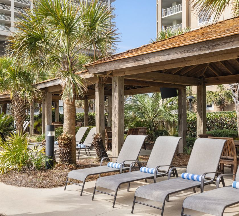Stunning cabana featuring ample seating for guests to relax.