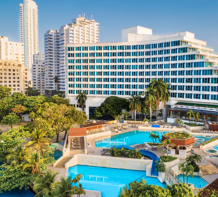 Hotel Exterior and Large Outdoor Pool Area