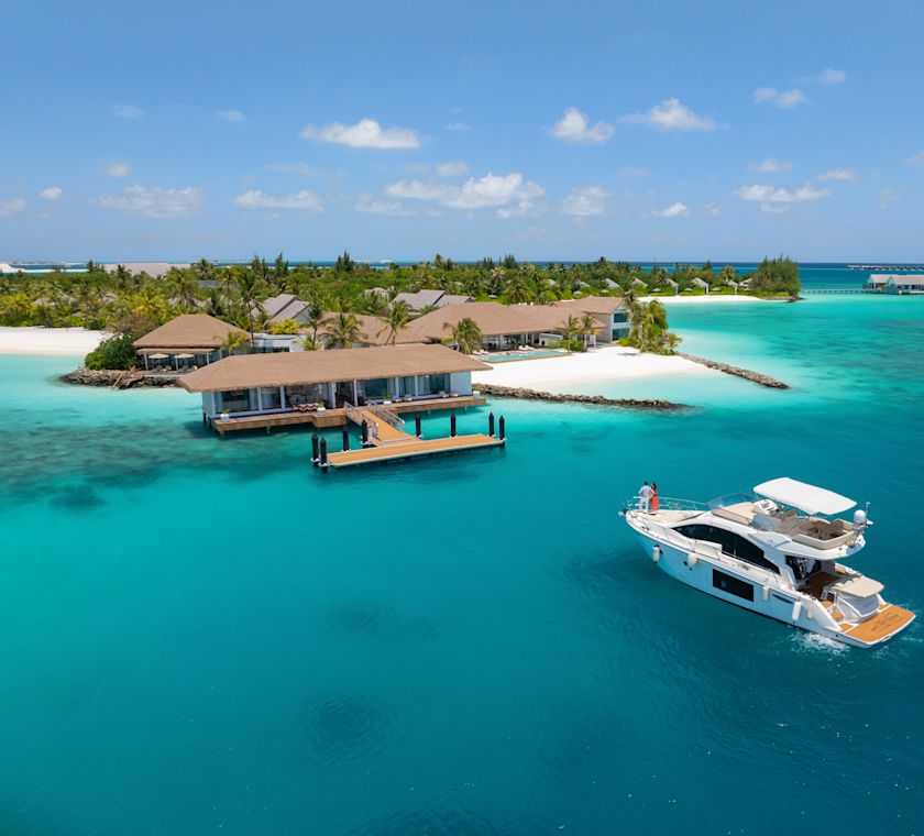 boat in the ocean in front of property