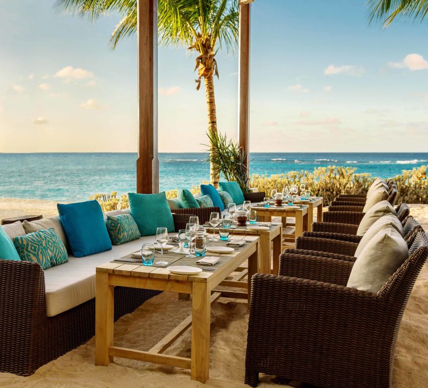 Dining table setup on beach