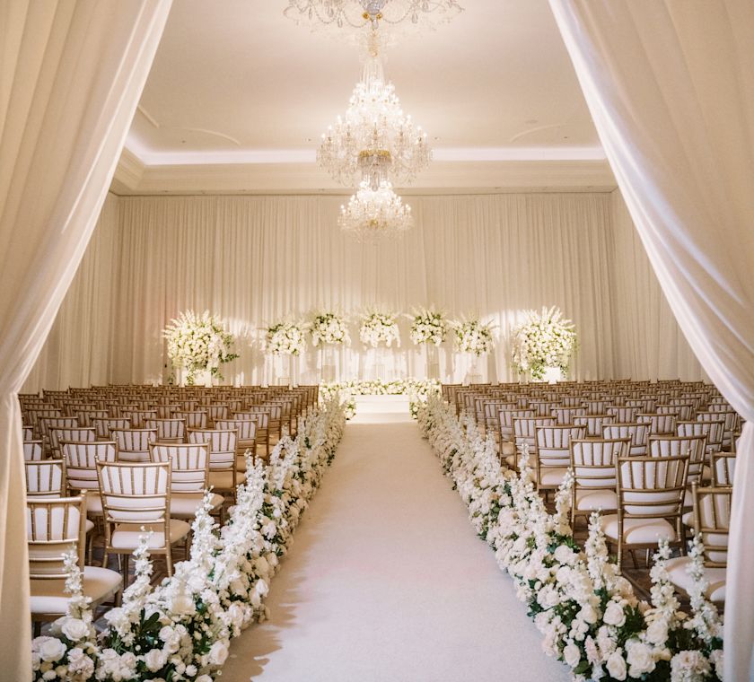 ballroom, wedding ceremony set up, white flowers