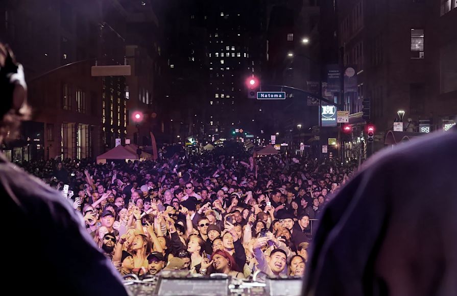 People Having Fun Attending the Downtown First Thursdays Street Party in San Francisco-transition