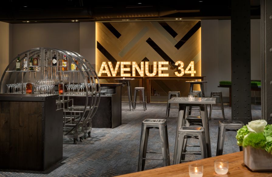 Avenue 34 space with tables, chairs and drinks-transition