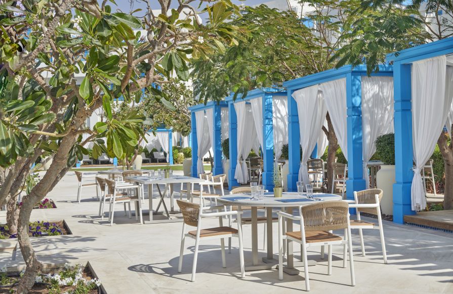 Outdoor seating with tables and chairs-transition