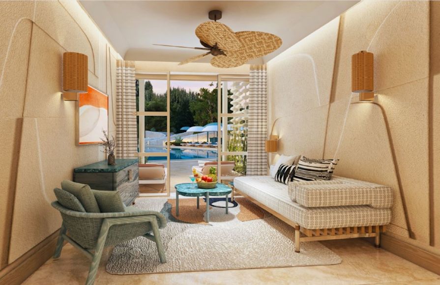 Innenansicht der Cabana am Swimmingpool mit Sitzbereich, Schreibtisch und Swimmingpool, der durch die Tür hindurch sichtbar ist