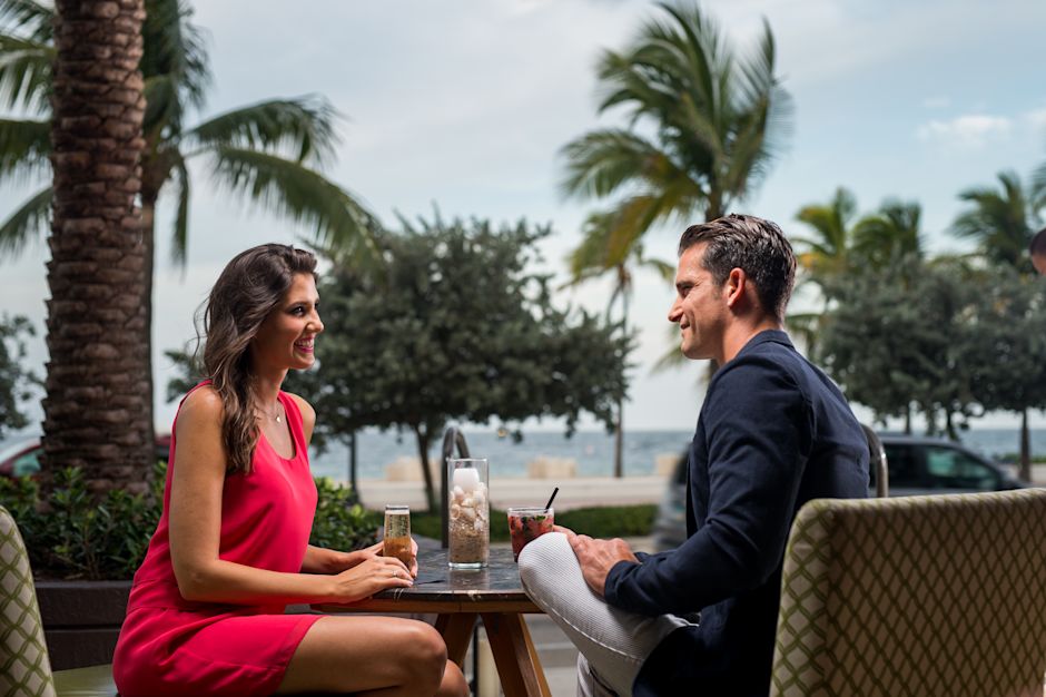 Couple Having Drinks at Sun, Surf and Sand Restaurant-transition