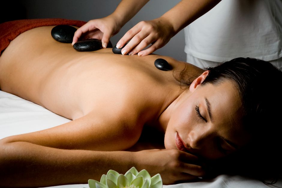 Woman Getting a Hot Stone Massage