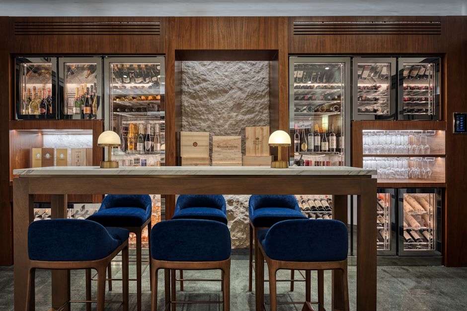 Aroma Wine Bar high top table for six, with a large wine cooler in the background.-transition